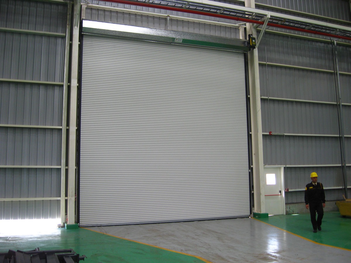 Our Model 2670 Oversize Heavy Duty Rolling Doors are designed for those openings with big dimensions, providing safety, great performance and a nice appearance for your building. Built with high quality materials for durability and reliability, the doors can be constructed to meet and exceed the very stringent High Velocity Hurricane Zones (H.V.H.Z) requirements of the current edition of the Florida State and Miami Dade Building Code.